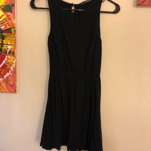 Little black cotton dress with embroidered details